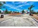 Open plaza with water feature surrounded by modern buildings and lush landscaping at 17515 Jadestone Ct, Venice, FL 34293