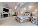 The main bedroom features a fireplace, a vanity area, and plenty of natural light for a calm atmosphere at 181 S Auburn Rd, Venice, FL 34292
