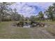 Scenic pond surrounded by lush greenery, enhancing the natural beauty of this tranquil property at 181 S Auburn Rd, Venice, FL 34292