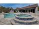 Backyard pool and spa with plenty of room for entertaining in this lovely home at 181 S Auburn Rd, Venice, FL 34292