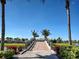 Picturesque bridge spanning a serene waterway, surrounded by tropical foliage at 19240 Isadora St, Venice, FL 34293