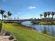 Quaint neighborhood bridge over the waterway, with lush landscaping at 19240 Isadora St, Venice, FL 34293