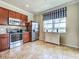 Well-equipped kitchen featuring stainless steel appliances and bright natural light at 19240 Isadora St, Venice, FL 34293