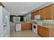 Bright kitchen featuring modern appliances and cabinets at 20246 Pezzana Dr, Venice, FL 34292