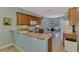 Open-concept kitchen with breakfast nook and modern appliances at 20246 Pezzana Dr, Venice, FL 34292