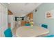 Open-concept kitchen featuring a breakfast nook with natural light at 20246 Pezzana Dr, Venice, FL 34292