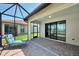 Pavered lanai with water view at 20246 Pezzana Dr, Venice, FL 34292