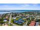 An aerial shot of a waterfront community featuring canals and docks, ideal for boating enthusiasts and water lovers at 205 Cavallini Dr, Nokomis, FL 34275