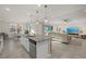 Open-concept kitchen with stainless steel appliances and views of the living room at 20591 Ovid Ln, Venice, FL 34293