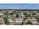 An aerial view highlights this home's prime location near local amenities and the surrounding cityscape at 2108 Lee Ln, Sarasota, FL 34231