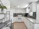 Beautiful kitchen with granite countertops, stainless steel appliances, and ample cabinet space at 2108 Lee Ln, Sarasota, FL 34231