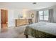 Inviting main bedroom with ensuite bathroom, natural light, and spacious layout at 2108 Lee Ln, Sarasota, FL 34231