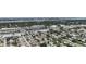 Aerial view displays the neighborhood, highlighting the mix of residential areas and bustling commercial centers nearby at 2108 Lee Ln, Sarasota, FL 34231