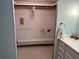 Spacious closet with ample storage space and built-in shelving at 22 Nautical Dr, North Port, FL 34287