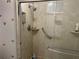 Shower with safety bars and light marble-like walls at 22 Nautical Dr, North Port, FL 34287