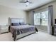 Luxurious bedroom featuring a plush bed, stylish nightstands, and contemporary decor with natural light at 220 Sarezzo Cir, Nokomis, FL 34275