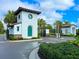 Community entrance gate providing security and privacy for residents at 220 Sarezzo Cir, Nokomis, FL 34275