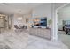 Open concept dining and living area featuring tile floors at 220 Sarezzo Cir, Nokomis, FL 34275