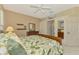 Spacious bedroom with walk-in closet, shelving and a peaceful ambiance at 2318 Harrier Way, Nokomis, FL 34275