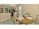 Charming dining area adjacent to kitchen, ideal for casual meals and gatherings at 2318 Harrier Way, Nokomis, FL 34275