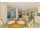 Inviting dining area connects to the kitchen and offers easy access to the lanai and living areas at 2318 Harrier Way, Nokomis, FL 34275