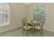Comfortable dining nook with natural lighting, offering a peaceful space to enjoy meals at 2318 Harrier Way, Nokomis, FL 34275