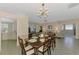 Bright dining area offers an open floor plan and ample space for entertaining guests at 2318 Harrier Way, Nokomis, FL 34275