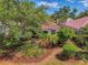 Beautiful single-story home with mature landscaping and a well-maintained garden at 2318 Harrier Way, Nokomis, FL 34275