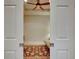 Flex room featuring tray ceiling with fan, decorative rug, and sliding doors at 275 Capulet Dr, Venice, FL 34292