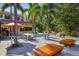 Expansive outdoor patio with dining and seating areas, perfect for hosting gatherings at 2750 Gocio Road Ext, Sarasota, FL 34235