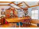 Nautical themed bar featuring custom boat bar, hardwood floors and wood beams at 2750 Gocio Road Ext, Sarasota, FL 34235