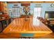Nautical themed bar featuring custom boat bar, hardwood floors and custom lighting at 2750 Gocio Road Ext, Sarasota, FL 34235