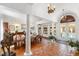 Spacious dining room with elegant decor, tile floors, and large windows at 2750 Gocio Road Ext, Sarasota, FL 34235
