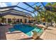 Relaxing screened pool area with a spa and lovely backyard views at 2750 Gocio Road Ext, Sarasota, FL 34235
