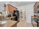 Kitchen featuring stainless steel appliances and stone countertops at 2834 Coolidge Ave, North Port, FL 34286