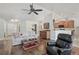 Bright living room featuring vaulted ceilings, hardwood flooring and open layout at 2834 Coolidge Ave, North Port, FL 34286