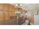 Bright dining area next to the kitchen featuring built-in cabinets and lots of storage at 301 Ravinia Cir # 301B2, Venice, FL 34292