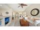 Open concept living space with a cozy entertainment area, modern decor, and plenty of natural light at 301 Ravinia Cir # 301B2, Venice, FL 34292