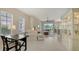 Bright and airy living room with a large window, comfortable seating, and stylish decor for relaxed living at 301 Ravinia Cir # 301B2, Venice, FL 34292