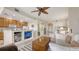 Open-concept living area seamlessly connecting to the kitchen with bright decor, lots of light, and comfortable seating at 301 Ravinia Cir # 301B2, Venice, FL 34292