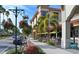 Charming street view with outdoor seating, landscaping, and a vibrant atmosphere at 301 Ravinia Cir # 301B2, Venice, FL 34292