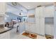 Well-equipped kitchen with granite countertops and ample cabinet space at 3181 E Village Dr, Venice, FL 34293