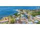 Scenic aerial view of waterfront homes with lush tropical landscaping, boat docks, and stunning water views at 320 O Day, Englewood, FL 34223