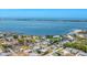 Scenic aerial view of homes along the waterfront with stunning views of the bay in the distance at 320 O Day, Englewood, FL 34223