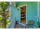 Charming balcony with views into the bedroom and surrounding foliage at 320 O Day, Englewood, FL 34223