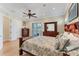 Spacious bedroom with wood furniture and sliding door access to balcony at 320 O Day, Englewood, FL 34223