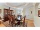 Traditional dining room with wood table, cabinet, and decorative rug at 320 O Day, Englewood, FL 34223