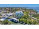 Beautiful waterfront home featuring a private boat dock and lush tropical landscaping at 320 O Day, Englewood, FL 34223