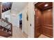 Bright hallway featuring a wooden elevator and access to multiple rooms at 320 O Day, Englewood, FL 34223