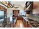 Beautiful kitchen with a large island, stainless steel appliances, and custom cabinetry at 320 O Day, Englewood, FL 34223
